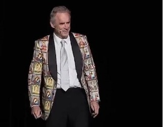 IZLEČIO SE U BEOGRADU, NOSI SAKO S PRAVOSLAVNIM SVECIMA Kako je svetski poznati psiholog iz Kanade, kog prati 9 miliona ljudi, spas pronašao u Srbiji (FOTO)